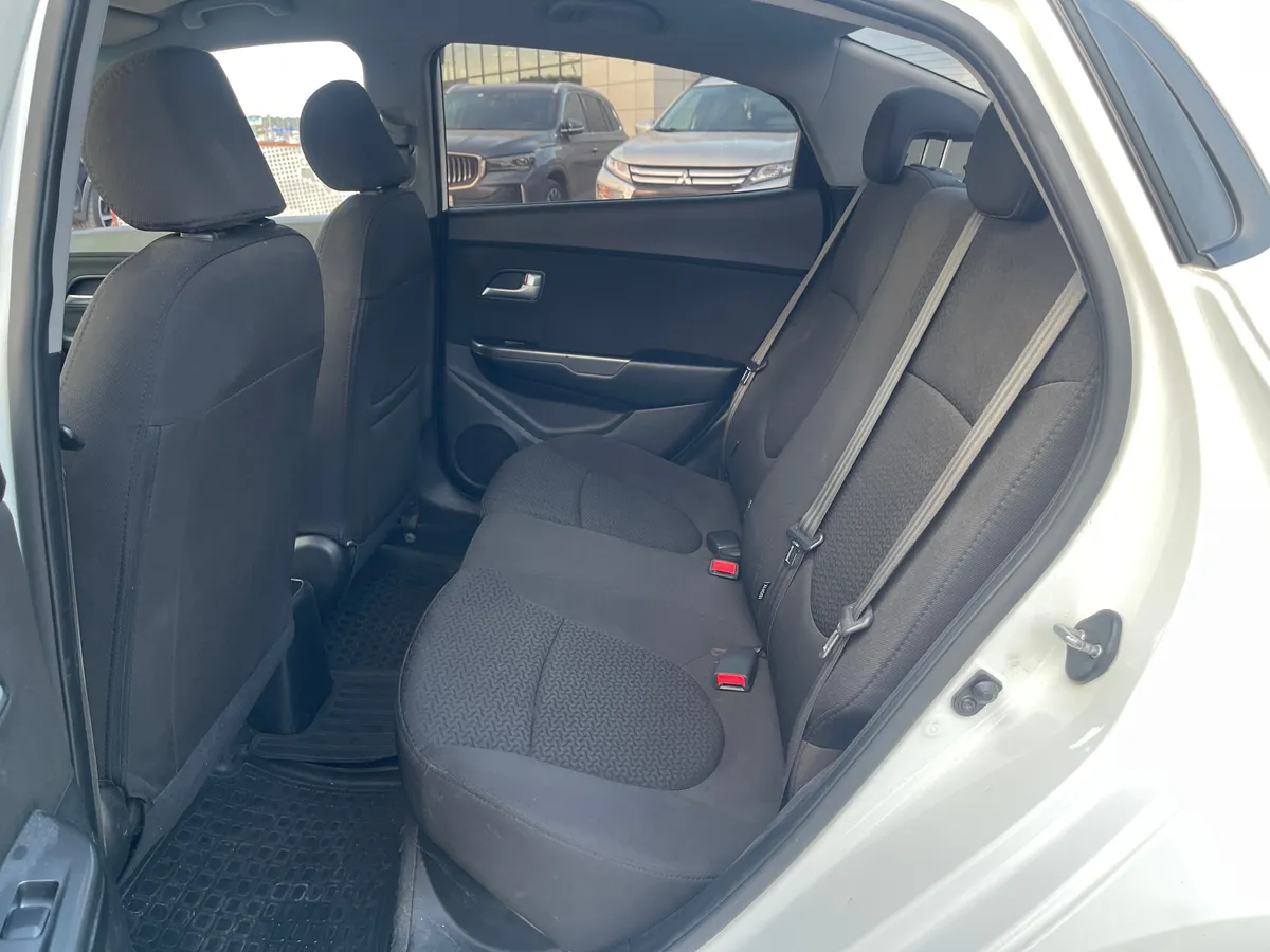 Kia Rio 1.6 AT (123 л.с.), 2013 — фото 12